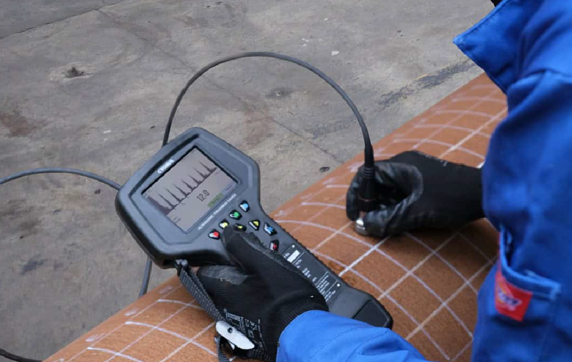 Thickness measurement done by a technician