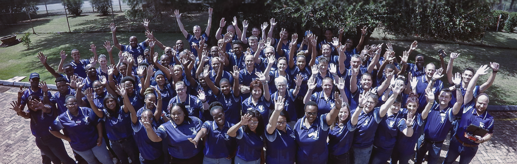 a group photo of the staff members of gammatec taken at the head office premises
