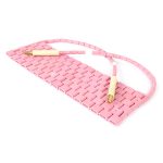 220 and 240 voltage pink ceramic pad heaters for heat treatment, placed on a white background
